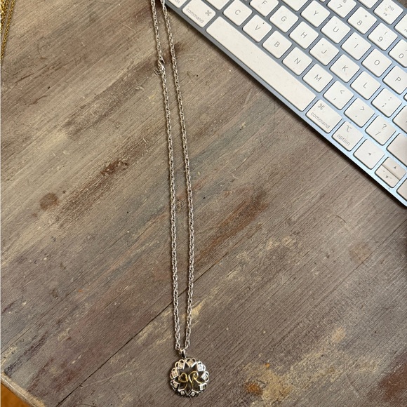 Nina Ricci Silver Necklace with Gold Pendant